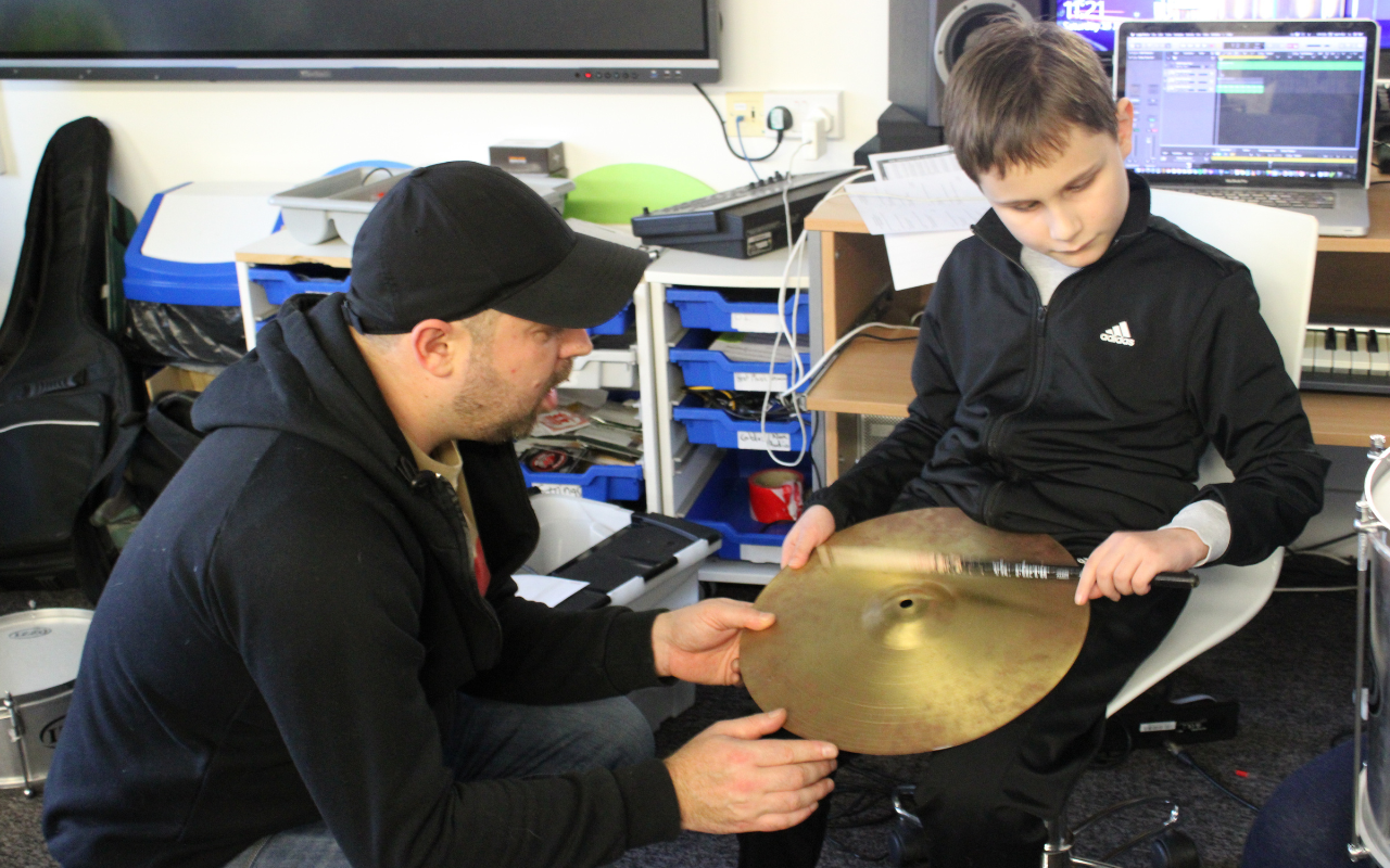 Young disabled boy learning music in Folkestone