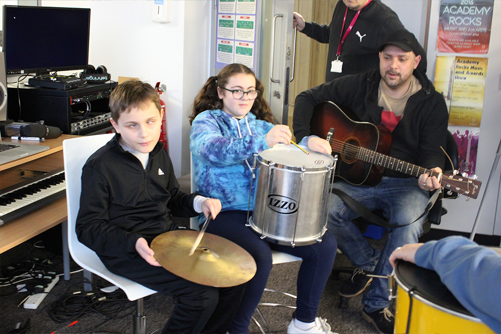 Kent and Medway Music Hub, Folkestone Music Centre disabled students learning music together, ensuring equality diversity and inclusion in music education