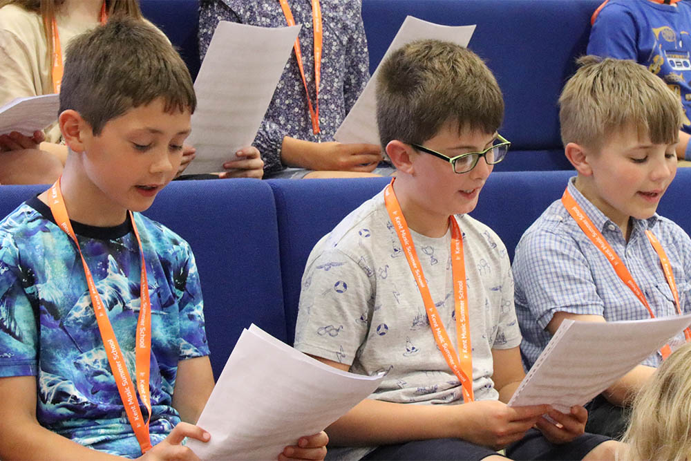 Young singers rehearsing with Gravesham Junior Choir
