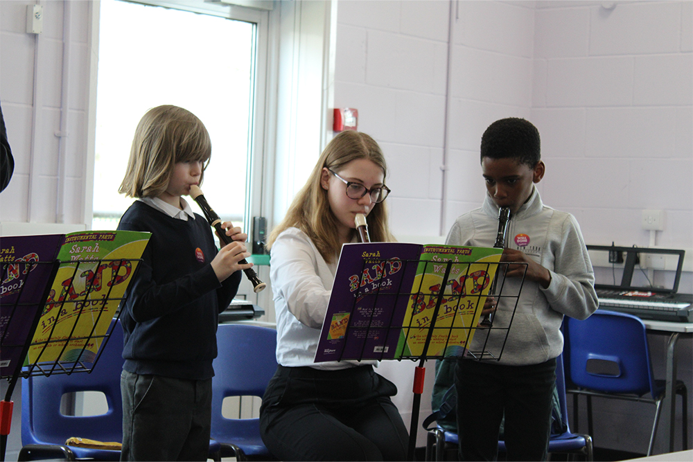 Young musicians learning to play music together with the Junior Recorders group in Medway