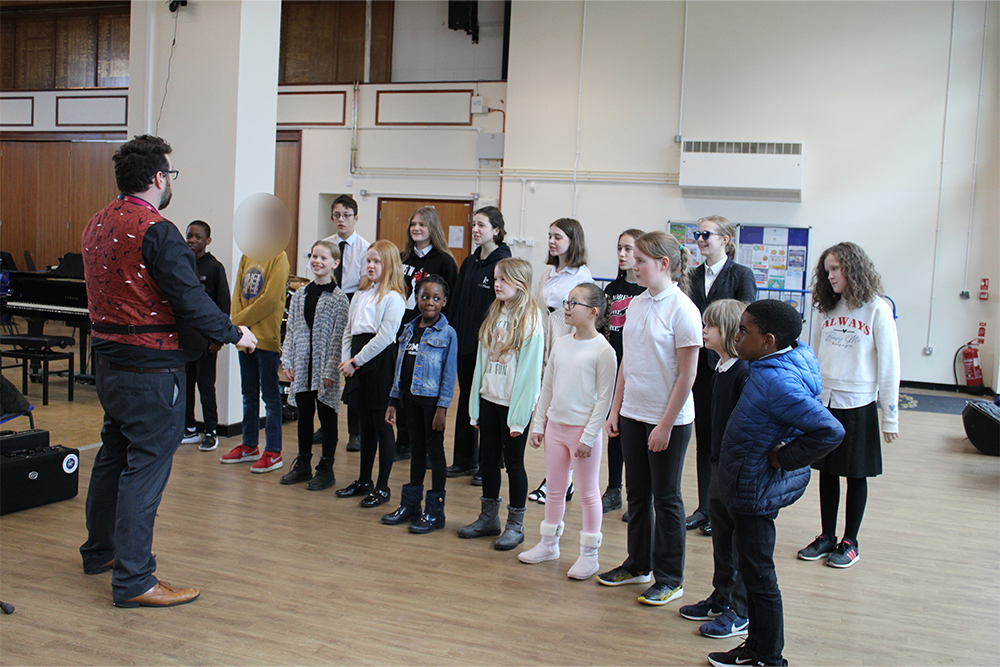 Students learning to sing at Medway Towns Music Centre Youth Voices Junior Choir