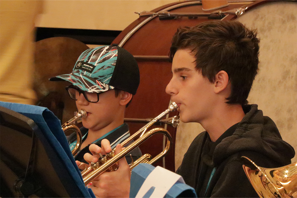 Young students playing trumpet the West Kent Brass Band at Sevenoaks Music Centre